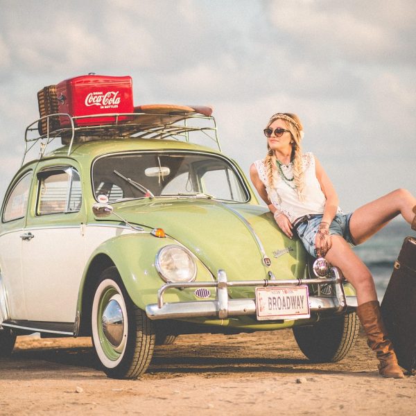 Holiday maker with rental car